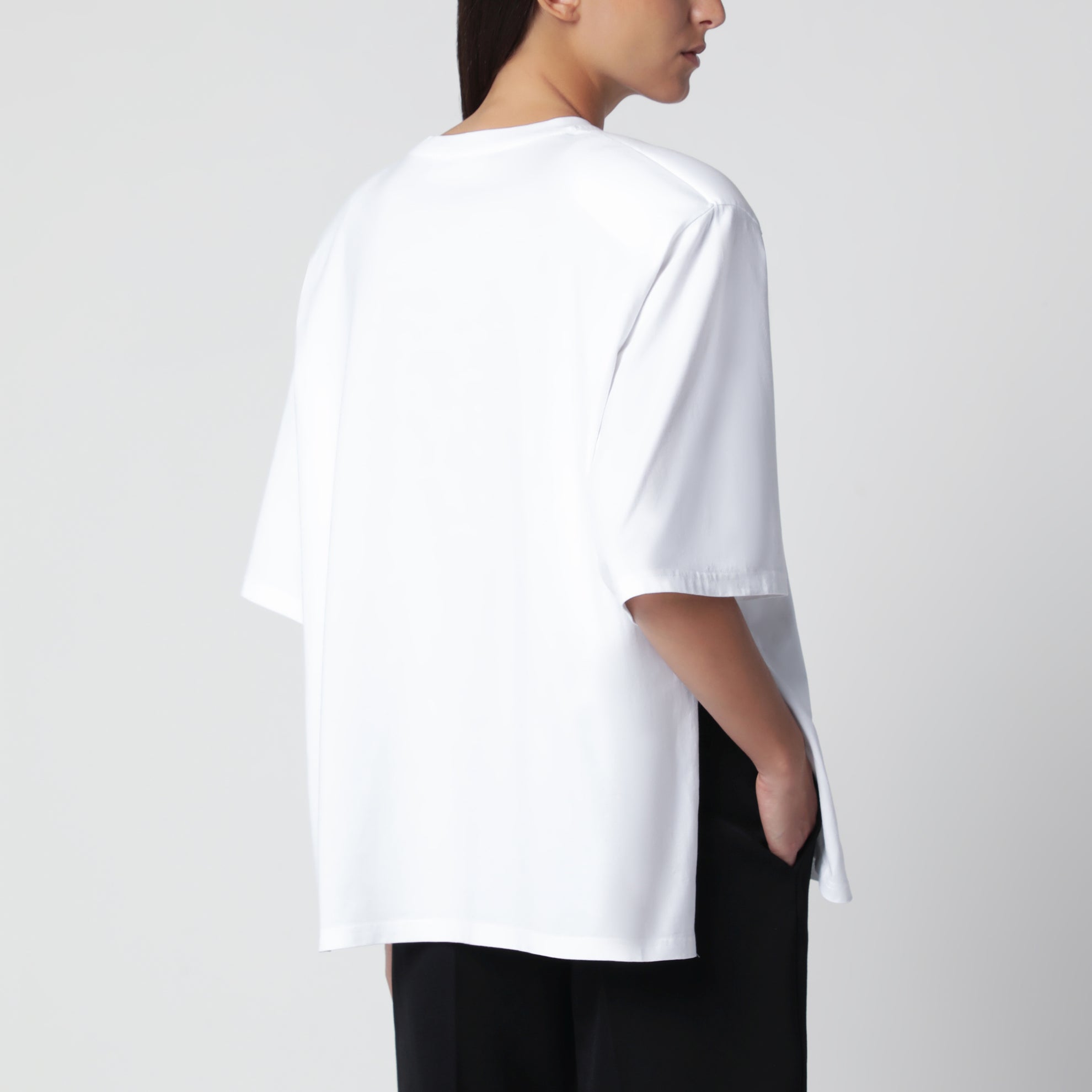 White oversized T-shirt with structured shoulders