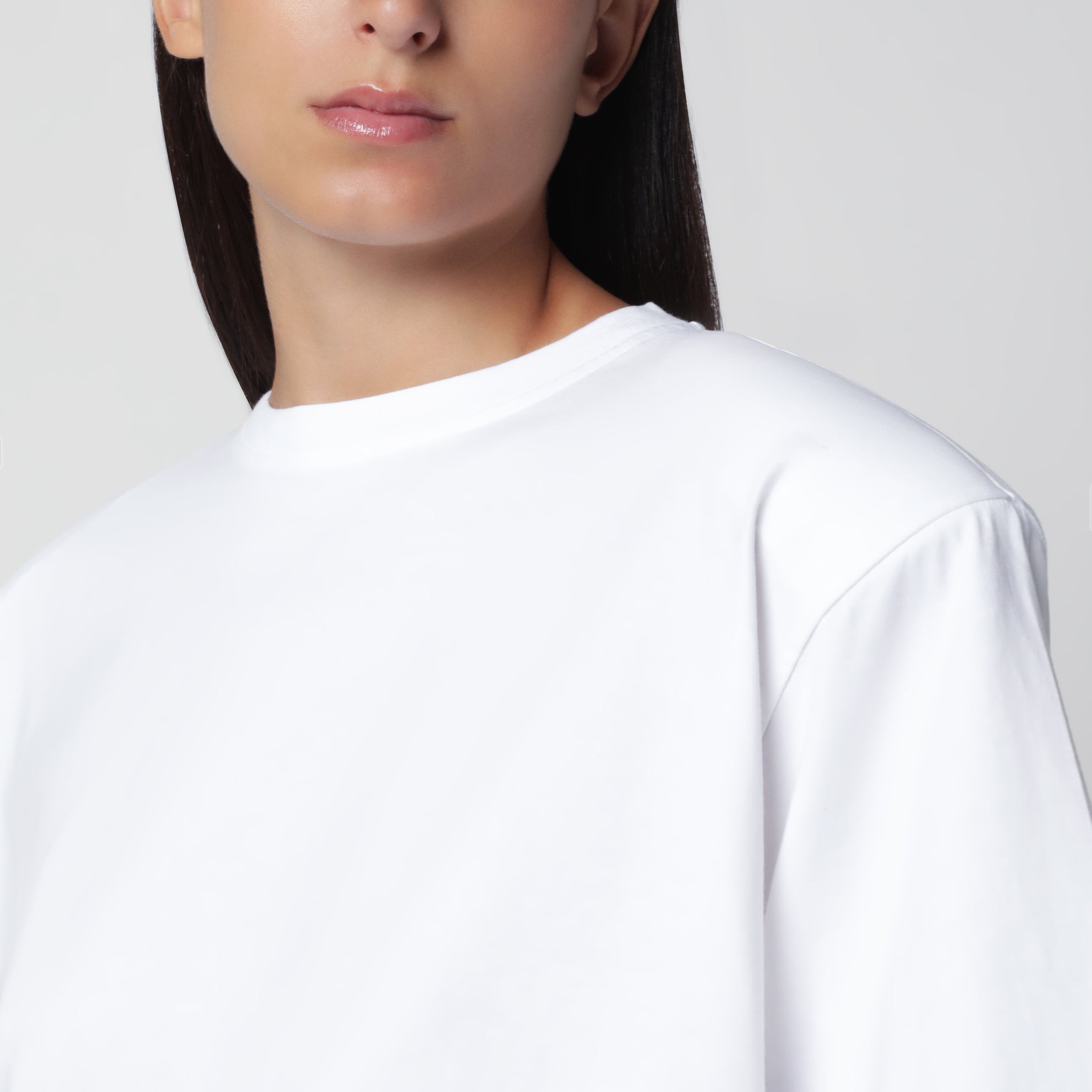 White oversized T-shirt with structured shoulders