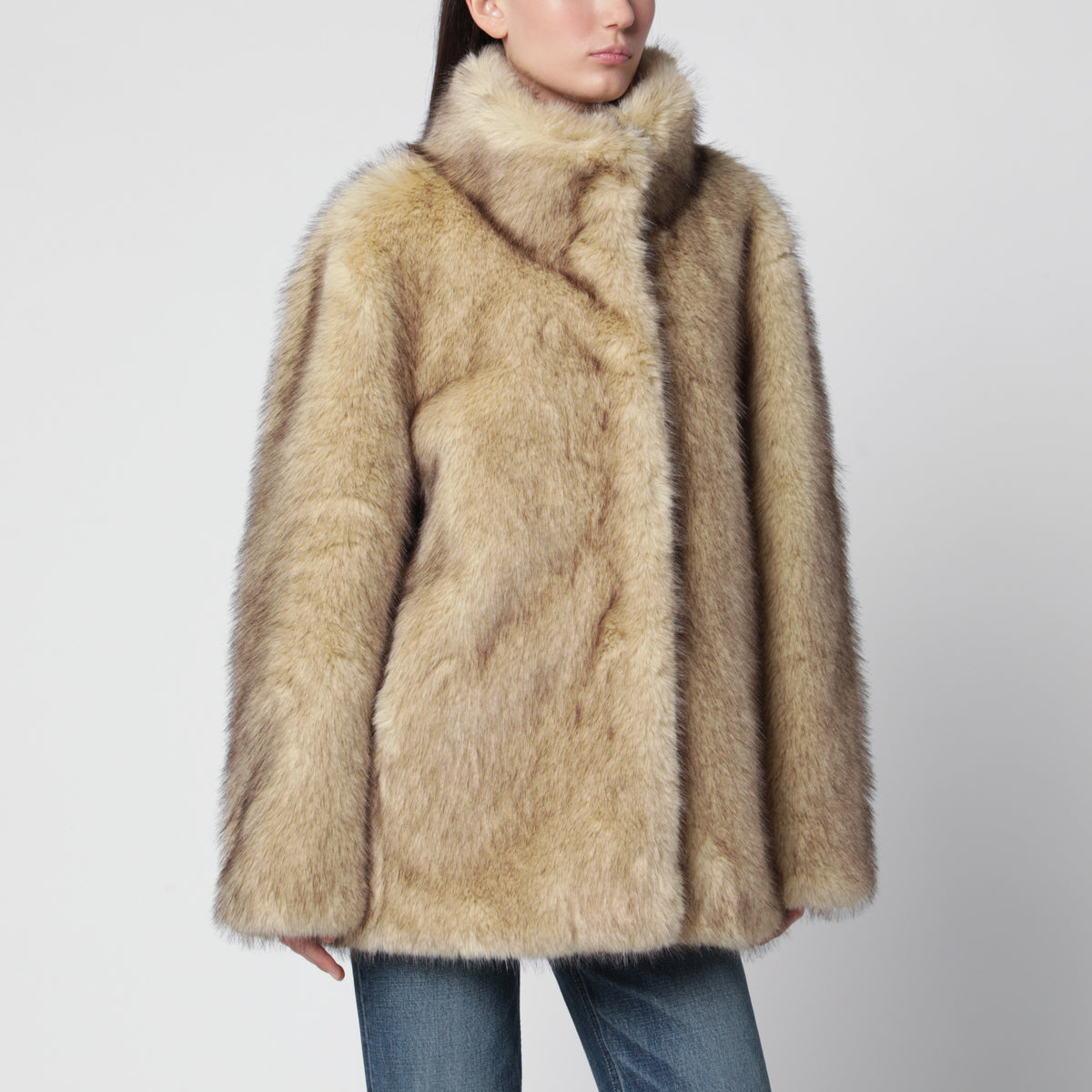 Veste beige en fausse fourrure