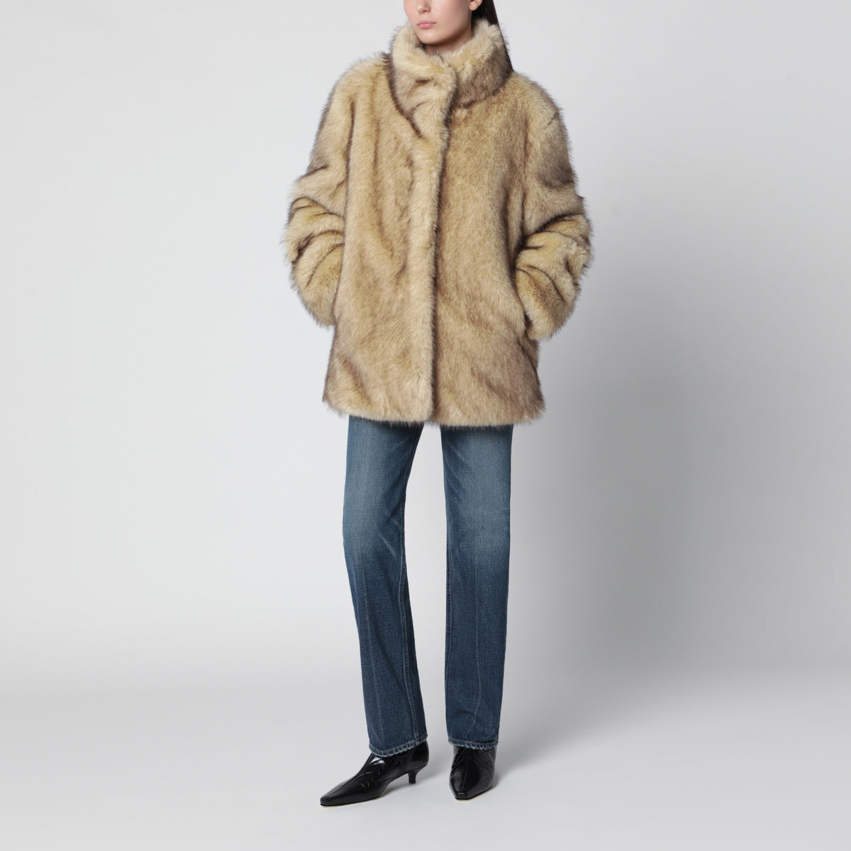 Veste beige en fausse fourrure