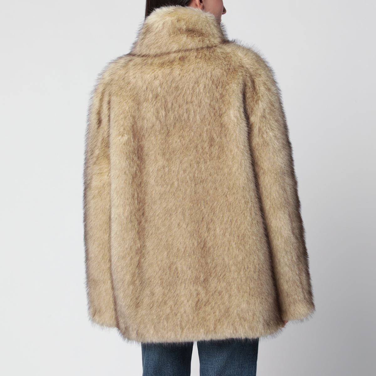 Veste beige en fausse fourrure