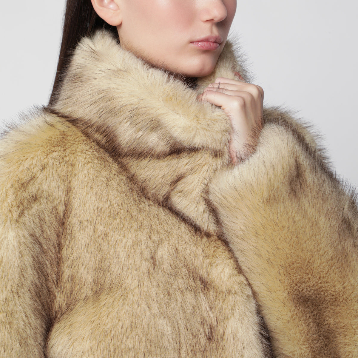 Veste beige en fausse fourrure