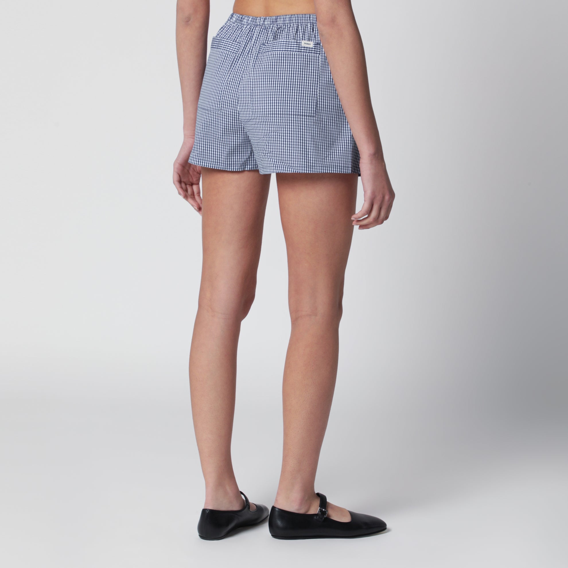 Mini shorts pigiama blu navy con motivo vichy