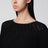 Maglia nera in misto cotone a trama larga