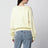 Light yellow crew-neck cardigan in wool blend