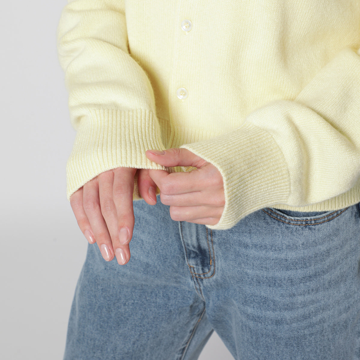 Light yellow crew-neck cardigan in wool blend