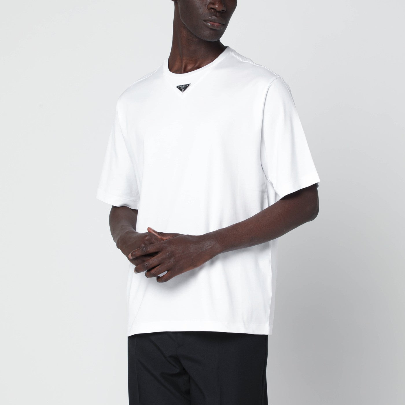 White T-shirt with triangle logo