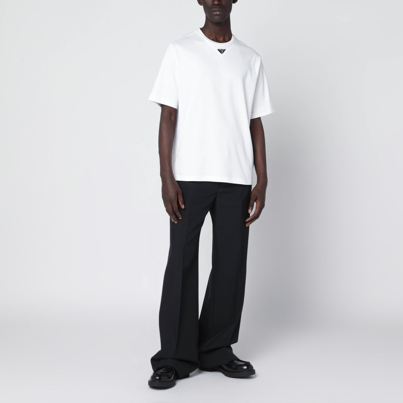 White T-shirt with triangle logo