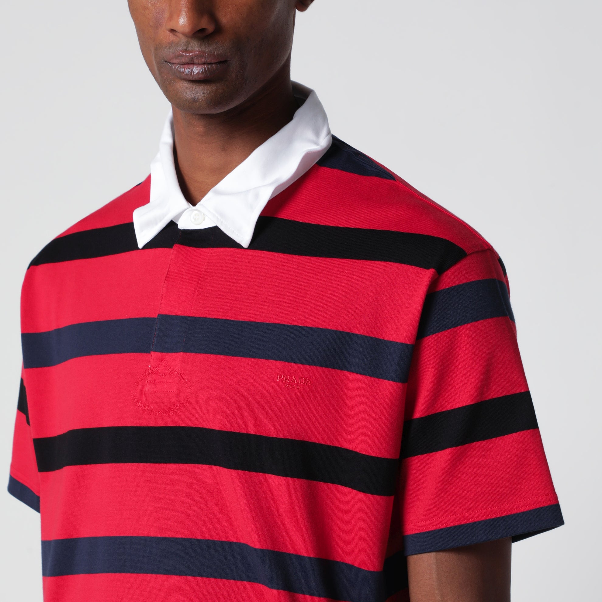 Polo a maniche corte a righe rosso / blu