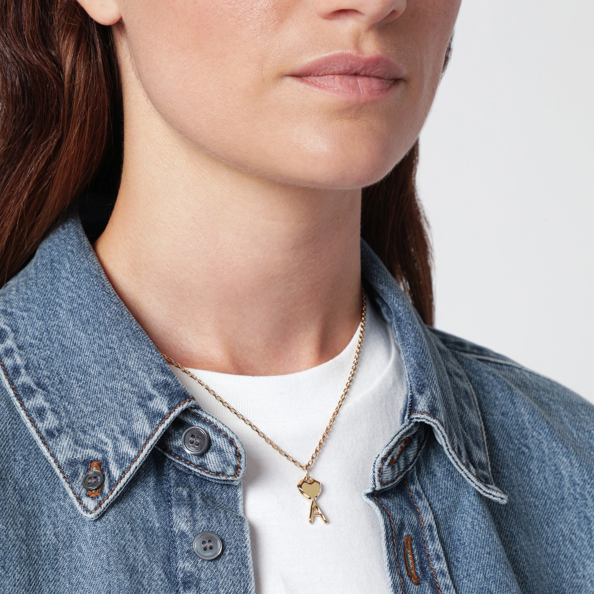 Petit collier AMI en laiton doré