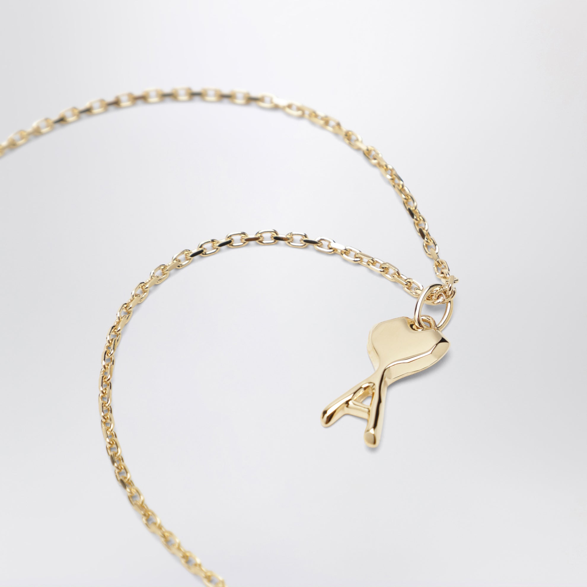 Petit collier AMI en laiton doré