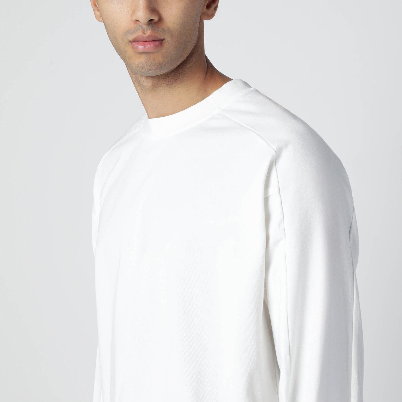 White long-sleeve top