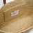 Raffia and leather shoulder bag