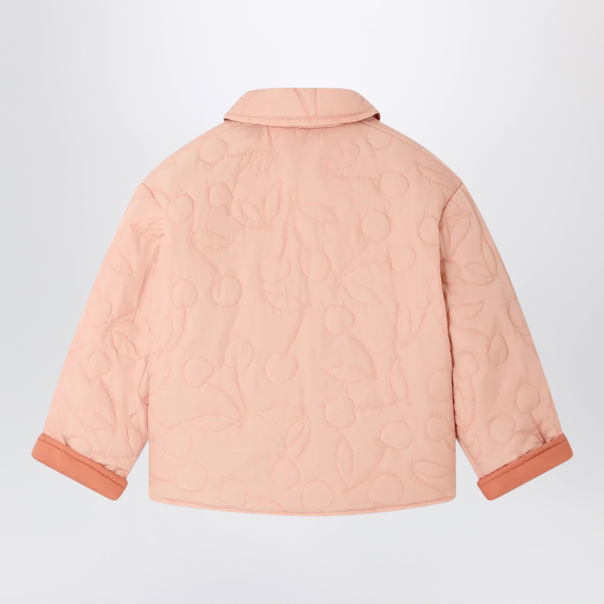Pink reversible quilted Molly jacket with cherries