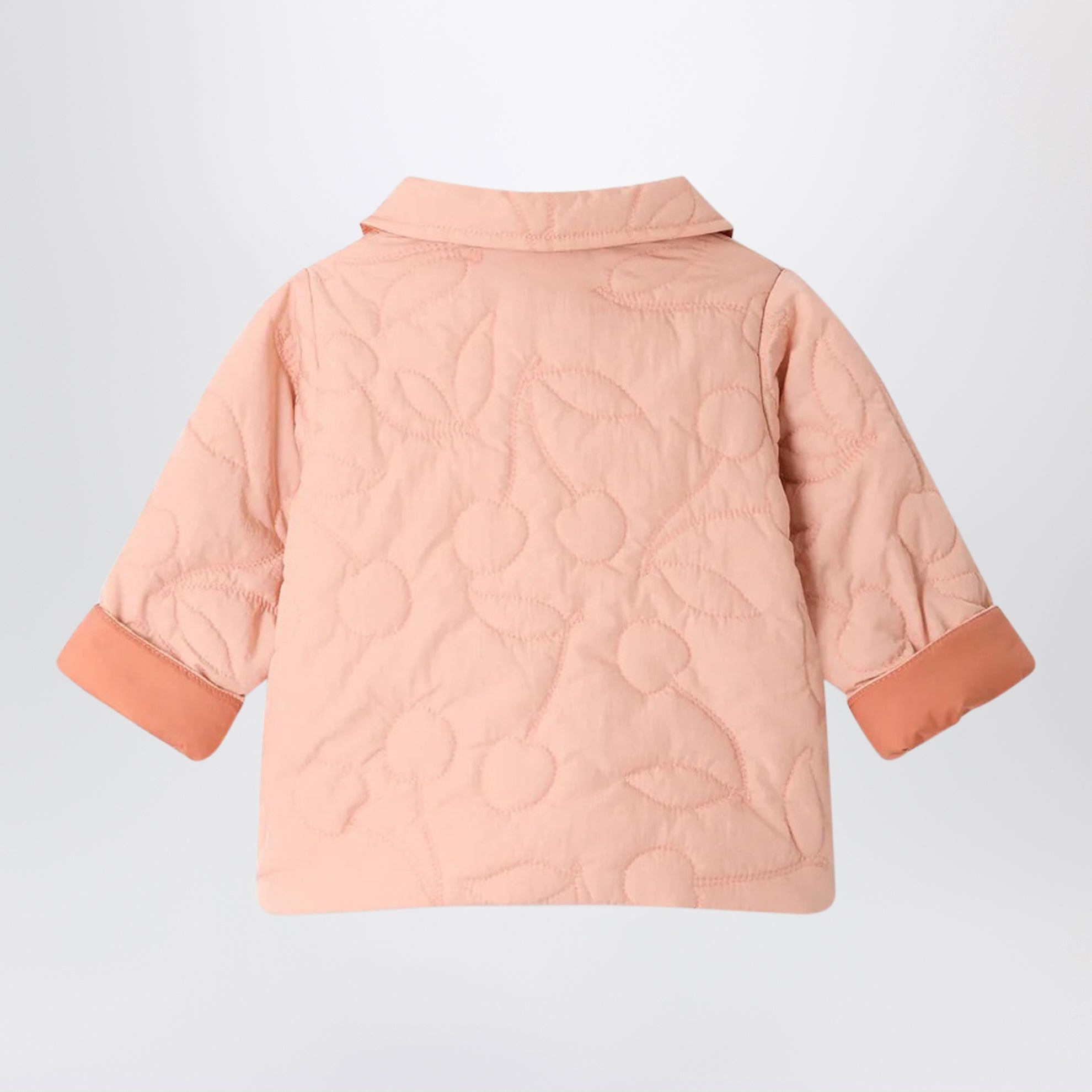 Reversible Juno quilted jacket in pink with cherry motif