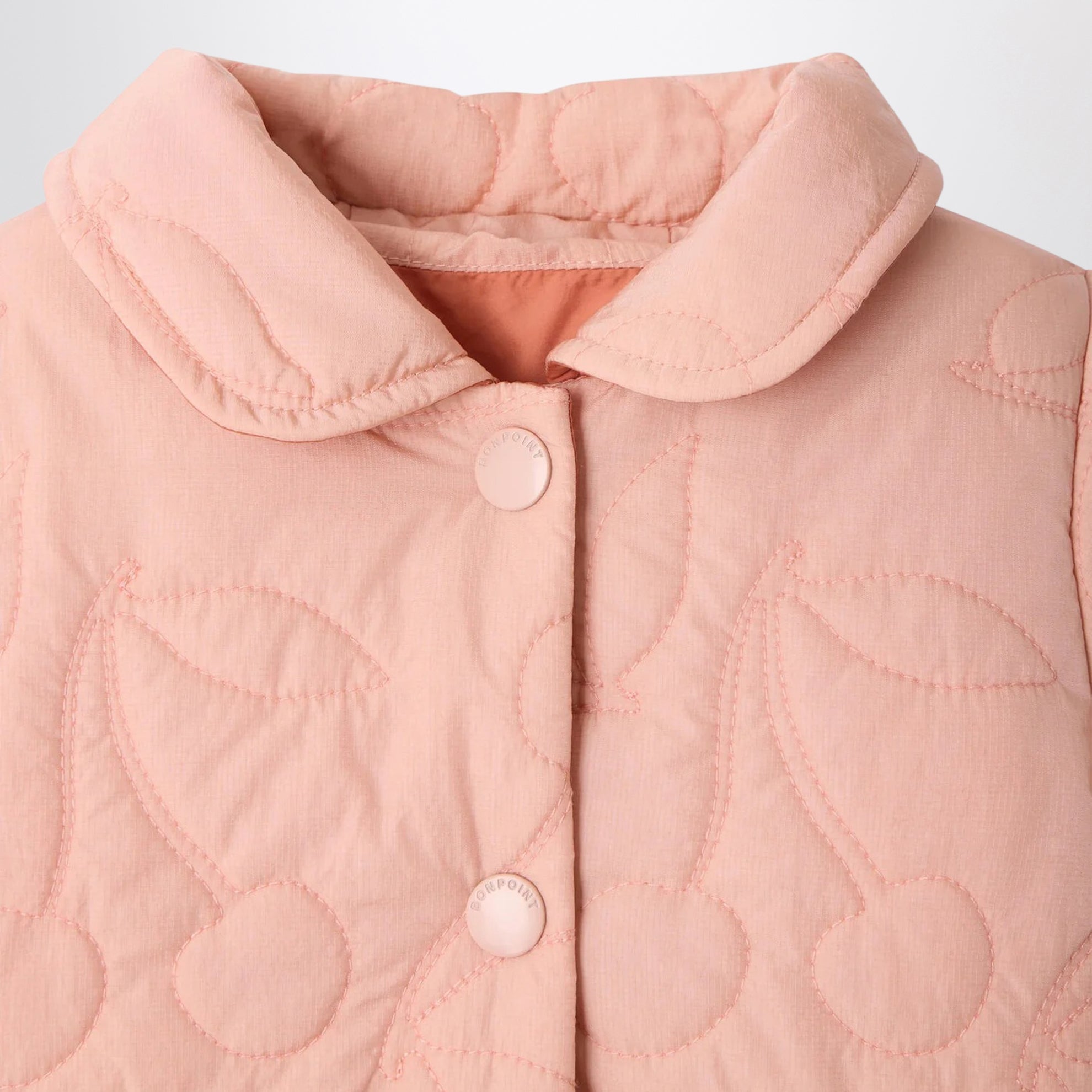Reversible Juno quilted jacket in pink with cherry motif