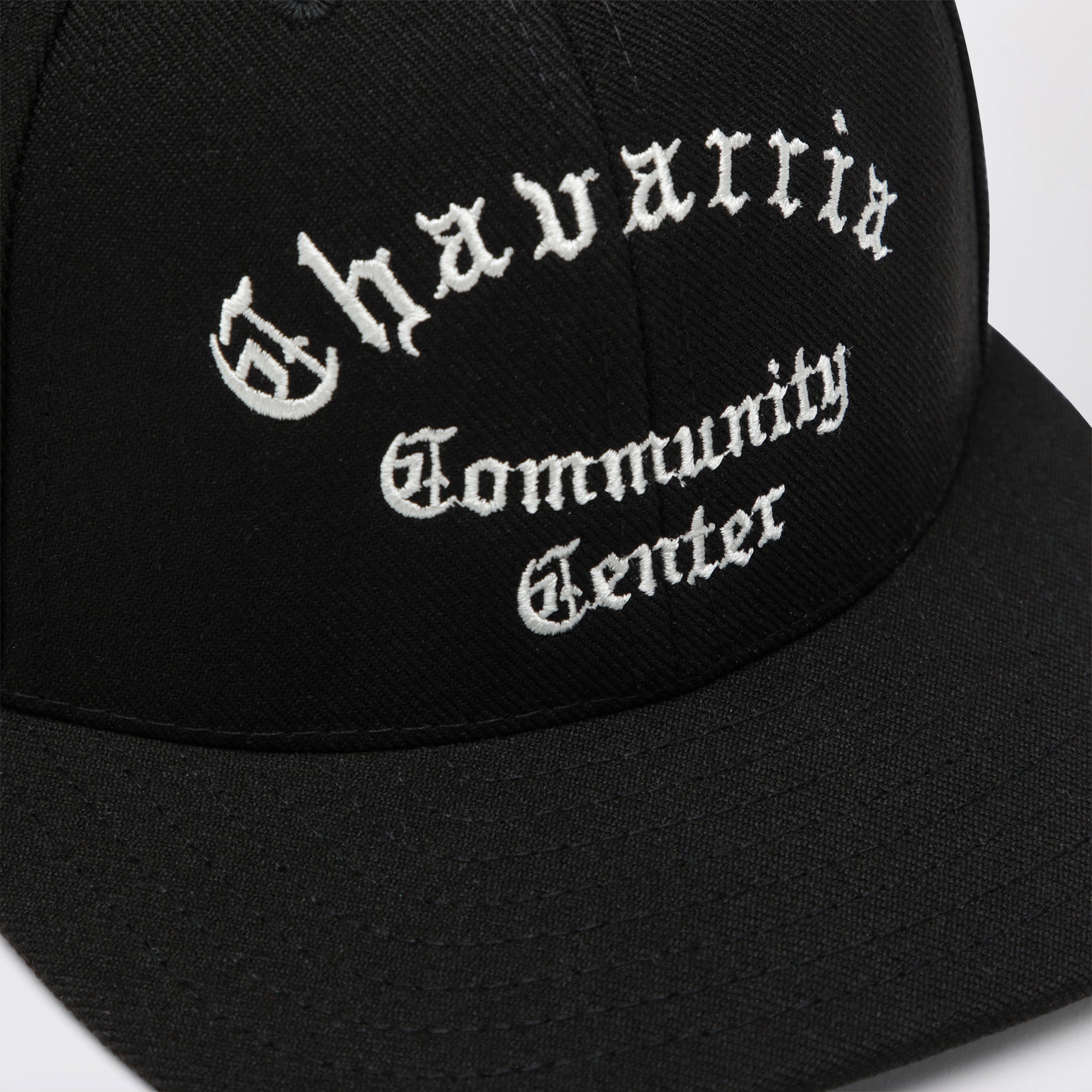 Black baseball cap with embroidered logo