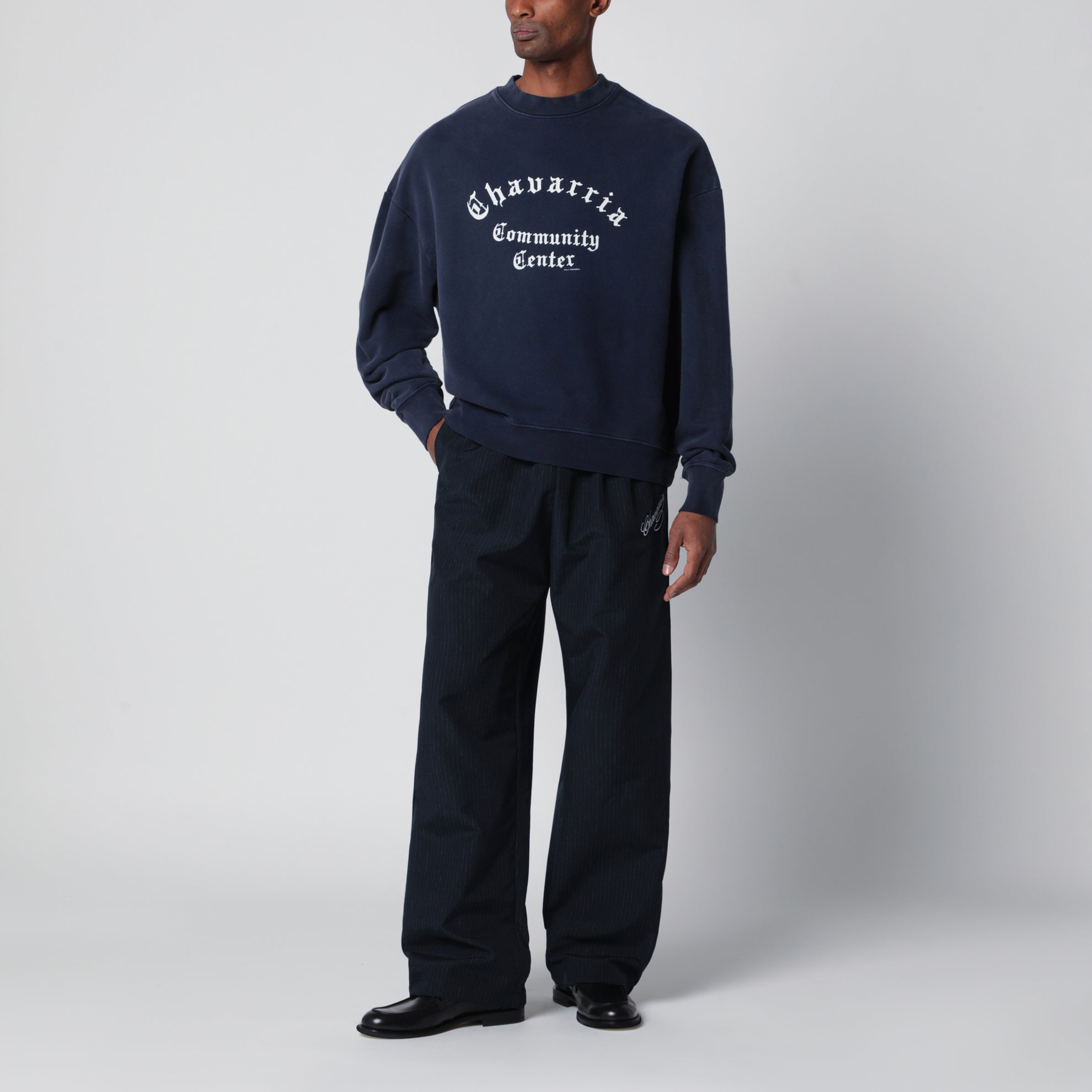 Pinstripe jogging trousers with logo embroidery