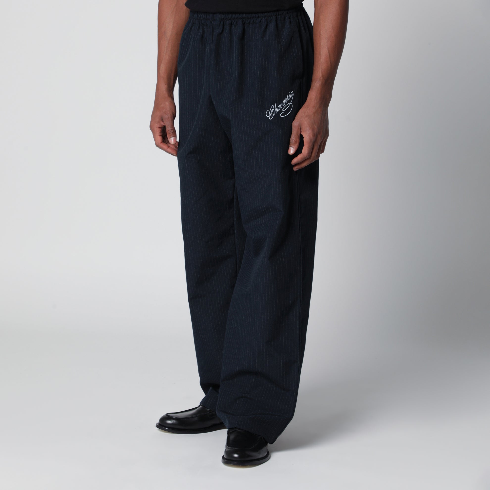 Pinstripe jogging trousers with logo embroidery