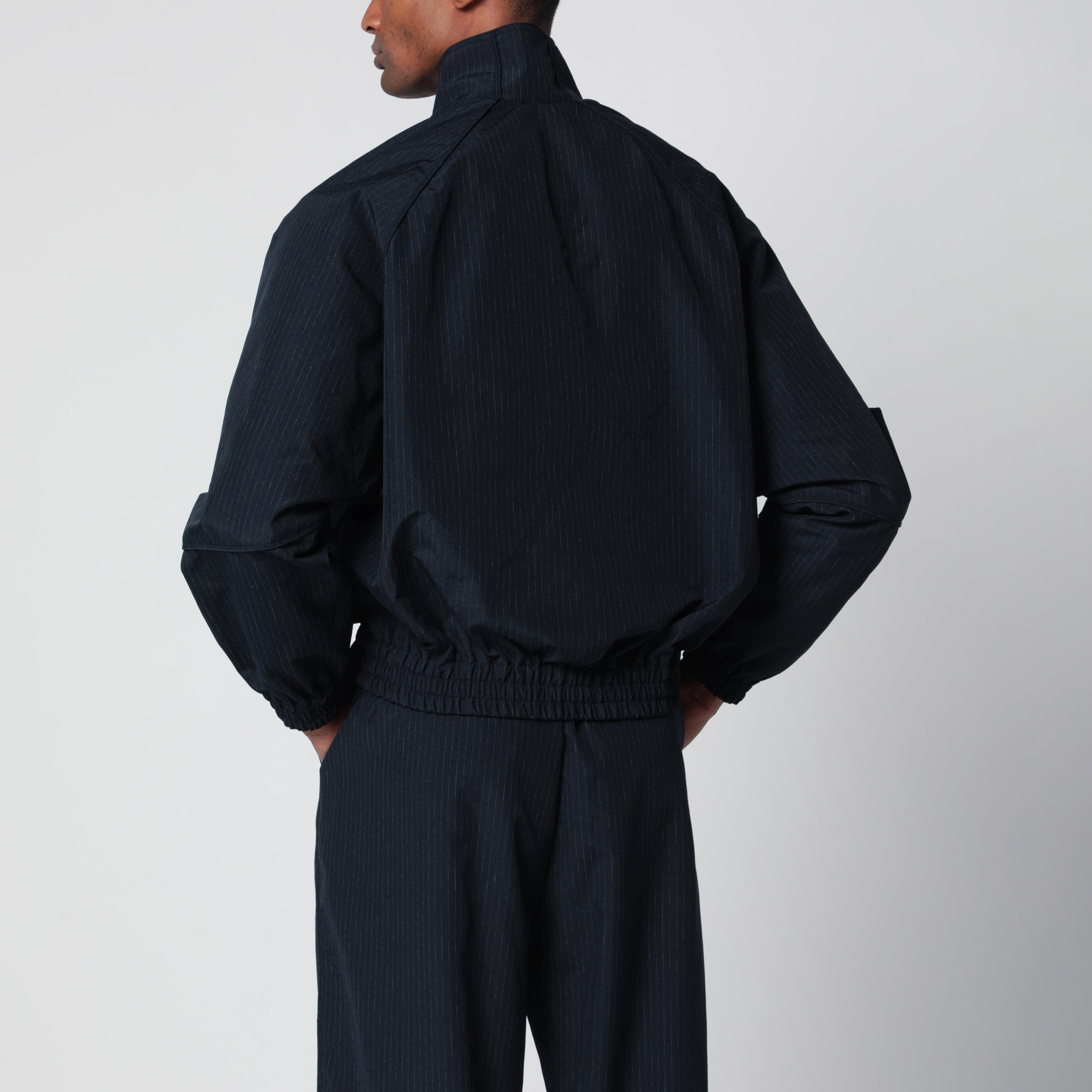 Willy Chavarria Pinstripe zip-up jacket with logo embroidery