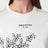 Cremefarbenes T-Shirt aus Baumwolle mit Logoprint