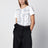 T-shirt bianca in lino ricamato e jersey di cotone stretch