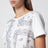 T-shirt blanc en lin brodé et jersey de coton stretch