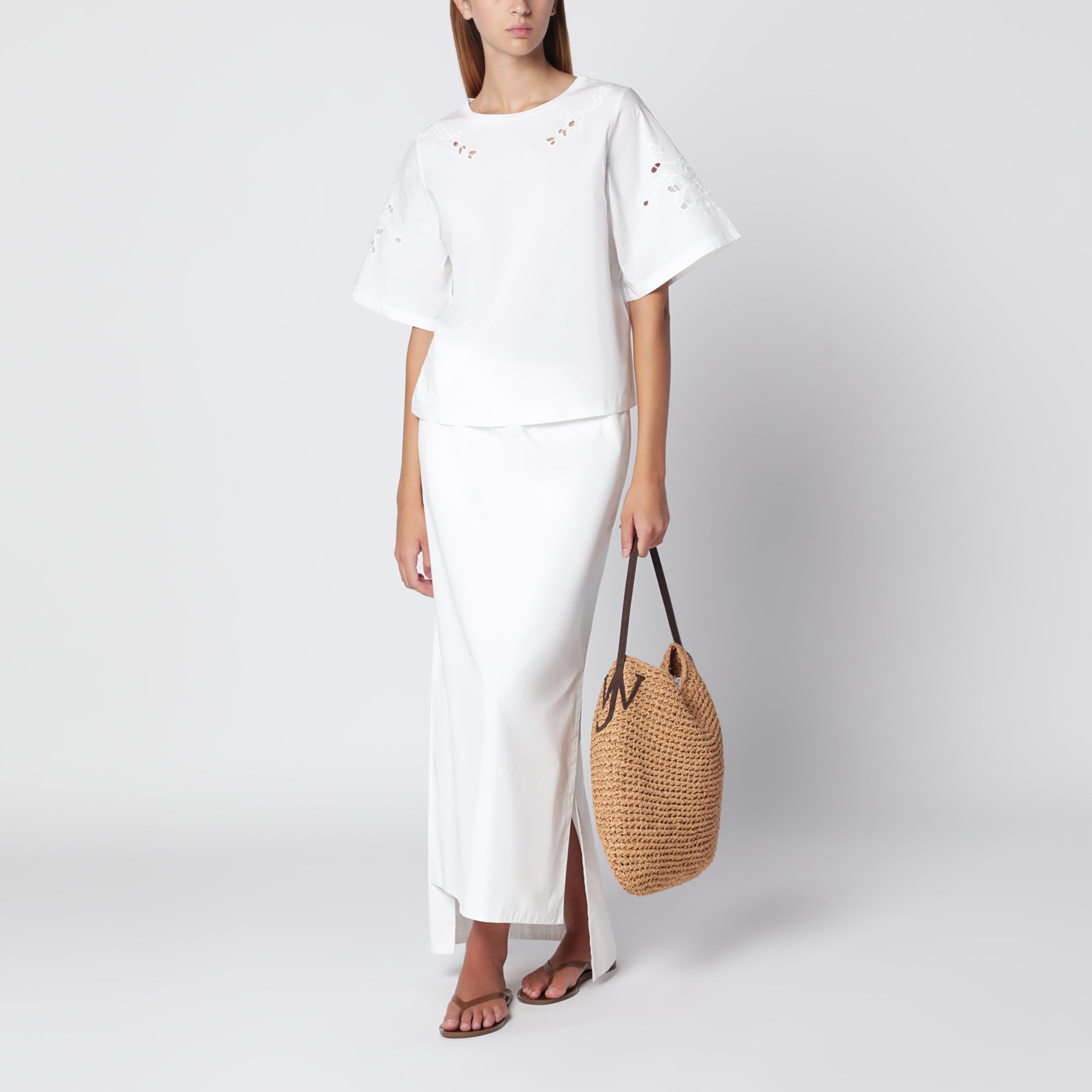 T-shirt blanc en coton avec broderies ajourées