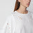 T-shirt blanc en coton avec broderies ajourées