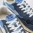 Reelwind Low Sneaker aus blauem Nylon und Veloursleder